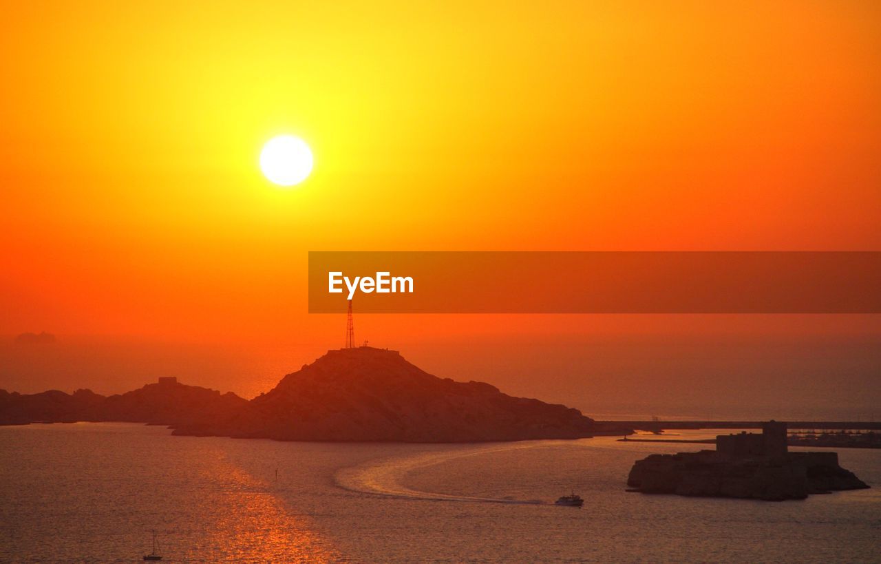 Scenic view of sea during sunset