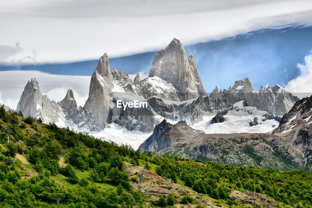 Scenic view of majestic mountains against sky