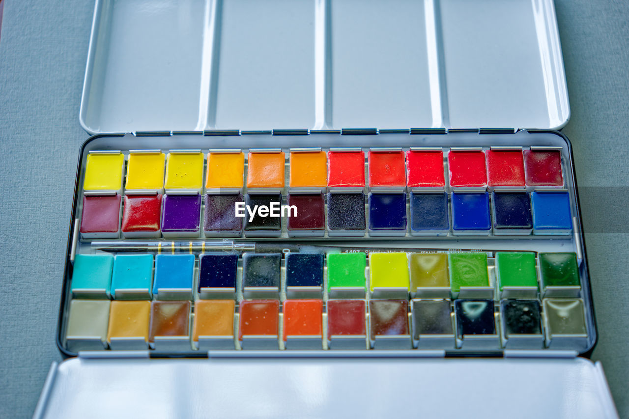 multi colored, variation, human eye, indoors, in a row, palette, large group of objects, close-up, studio shot, education