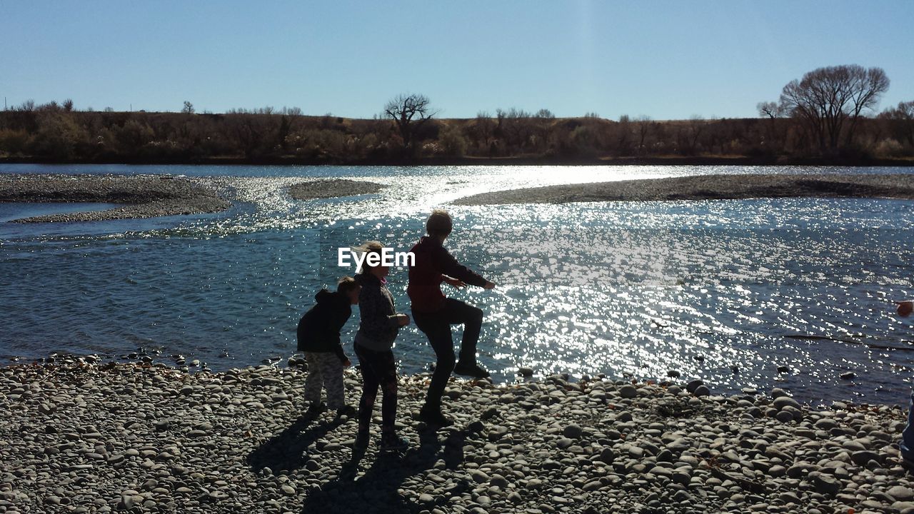 FATHER AND SON AT BEACH