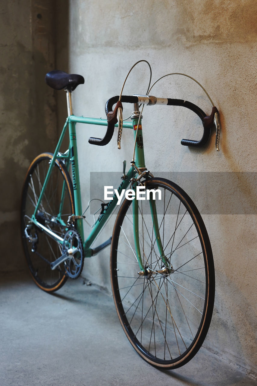 BICYCLES PARKED ON WALL