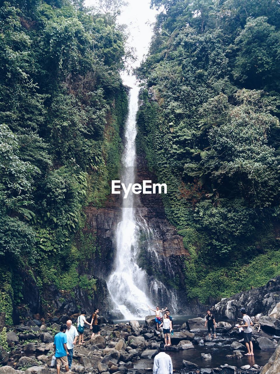 People visiting gitgit waterfall