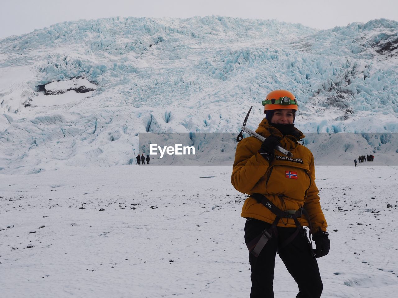 full length of man skiing on snow covered landscape