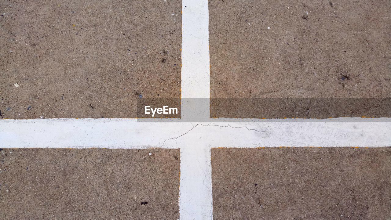 CLOSE-UP HIGH ANGLE VIEW OF PAVING STONE