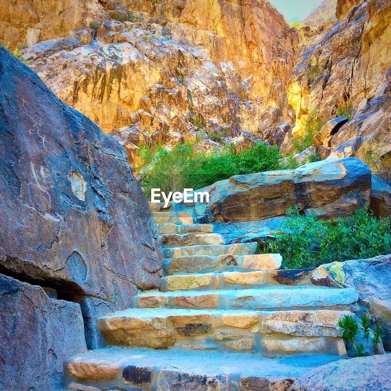 LOW ANGLE VIEW OF STEPS LEADING TOWARDS CLIFF