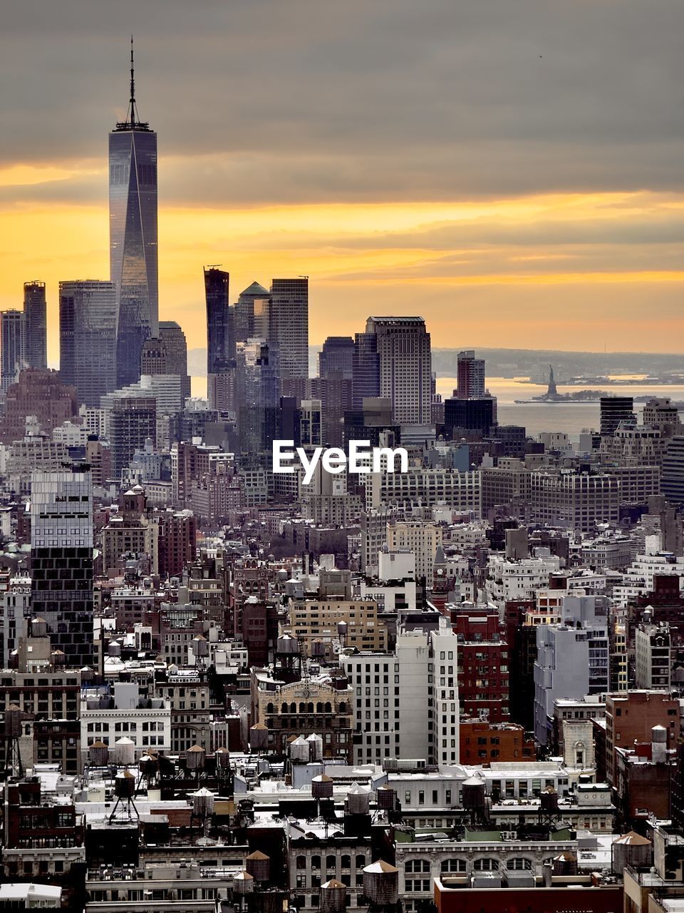 Cityscape against sky during sunset