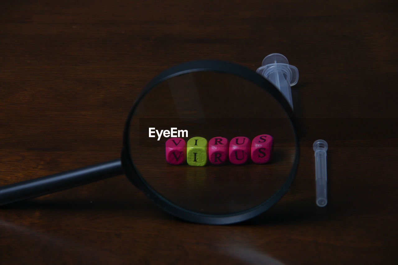 DIRECTLY ABOVE SHOT OF MULTI COLORED COFFEE ON TABLE