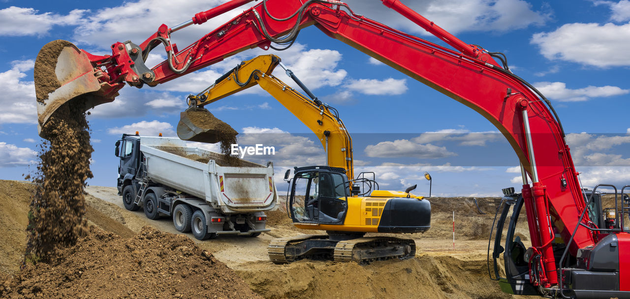 Excavator is working and digging at construction site