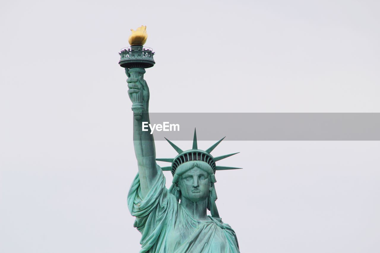 Low angle view of statue against clear sky