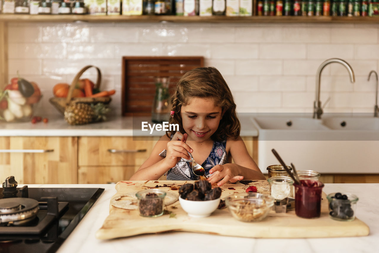 Girl cooking at home