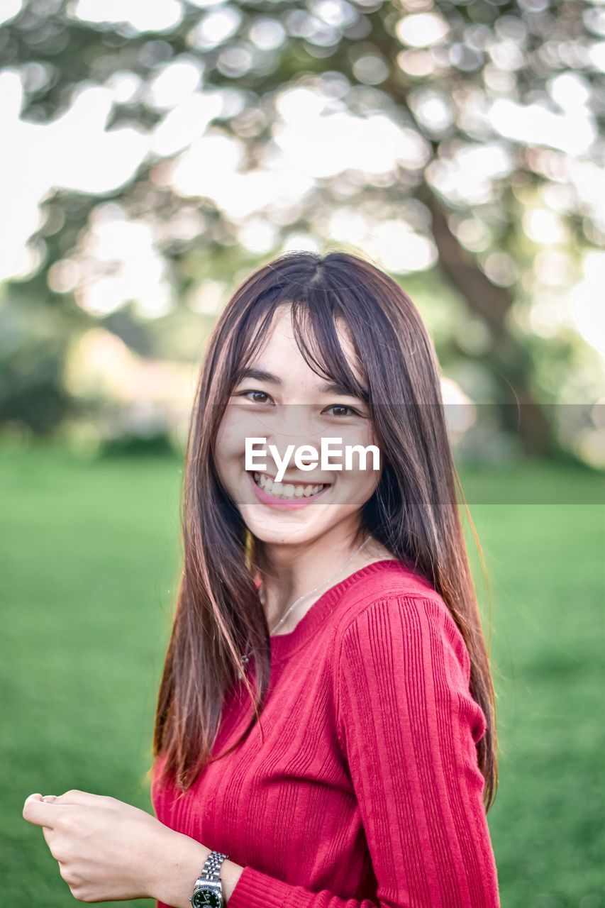 Close-up of smiling young woman