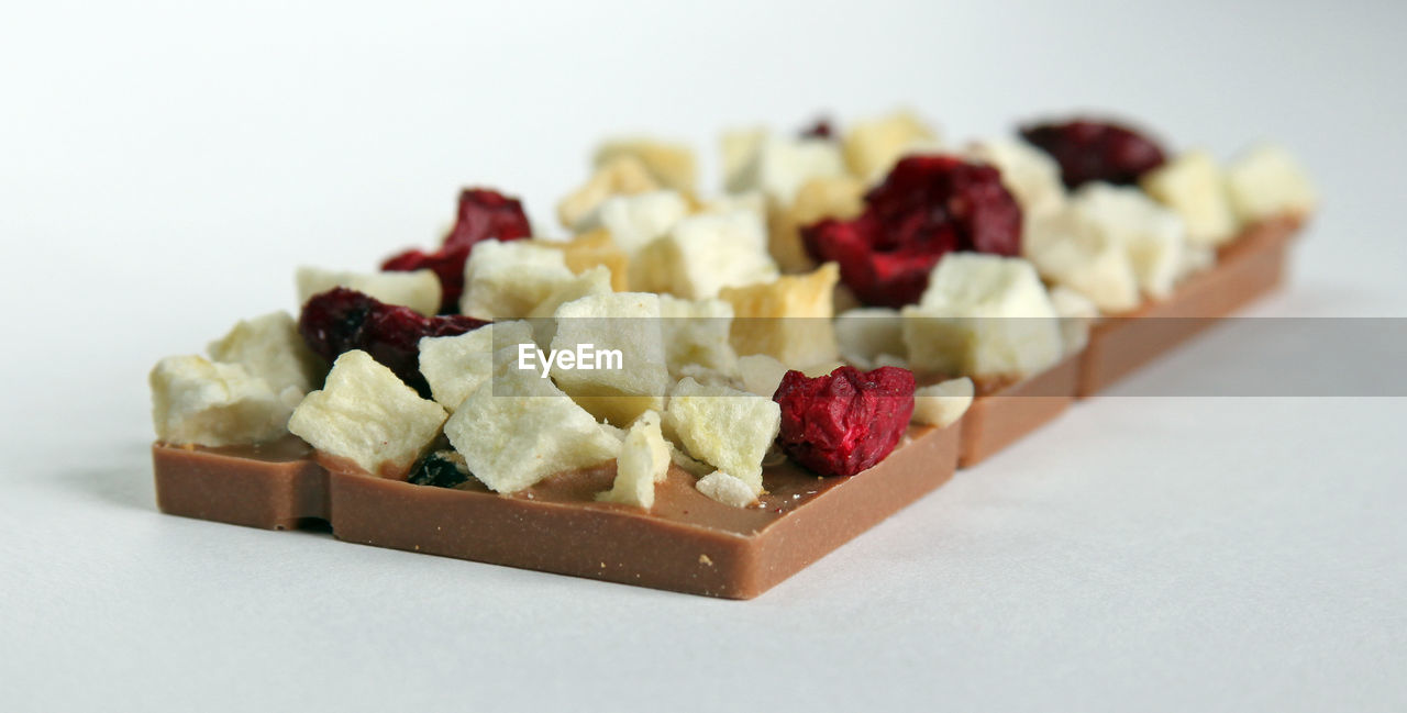 Handmade chocolates on white background