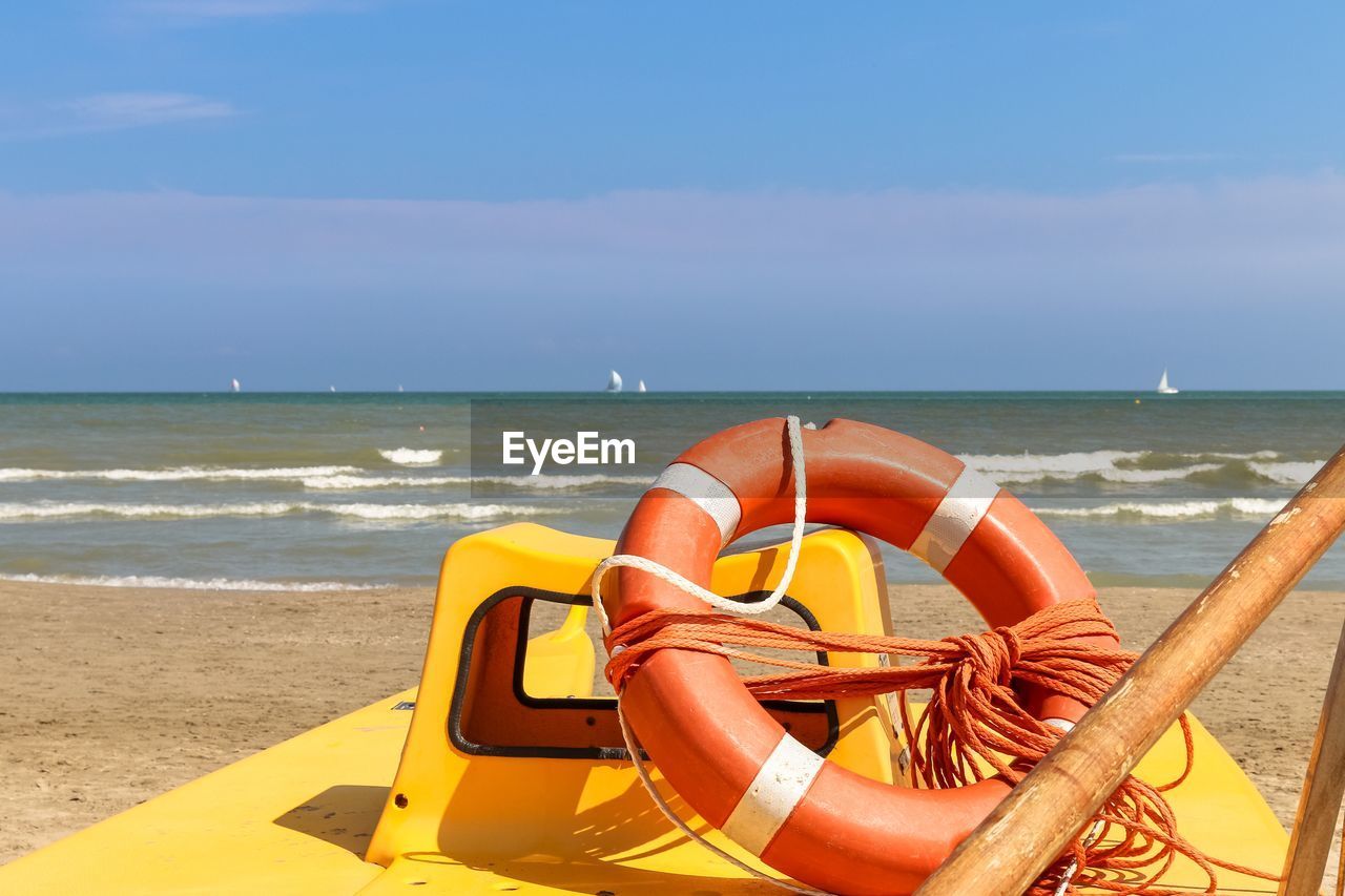 Lifebuoy on a lifeboat by the sea, italy, riccione