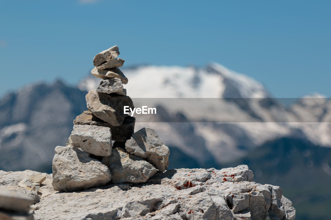 STACK OF ROCKS AGAINST MOUNTAIN