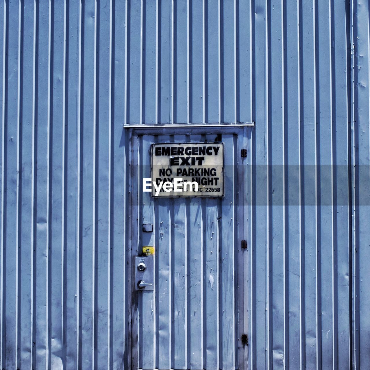Exit sign on closed door