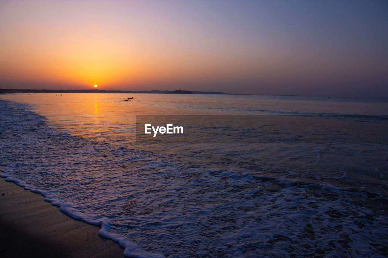 Scenic view of sea against sky during sunset