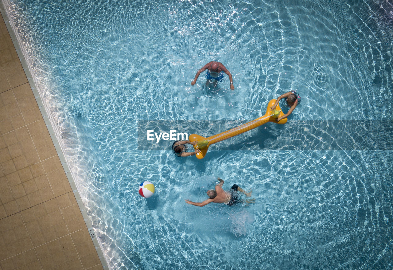 People swimming in pool