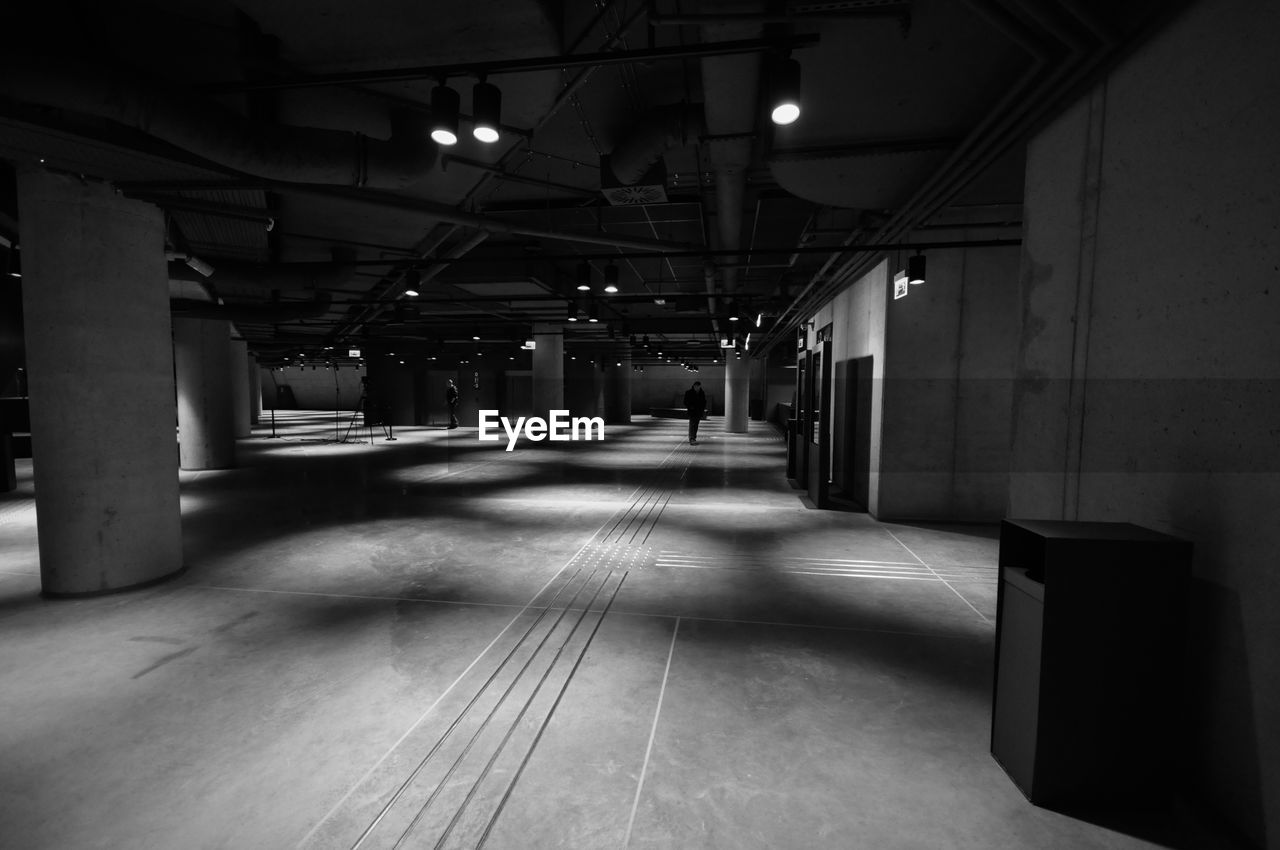 VIEW OF ILLUMINATED UNDERGROUND WALKWAY