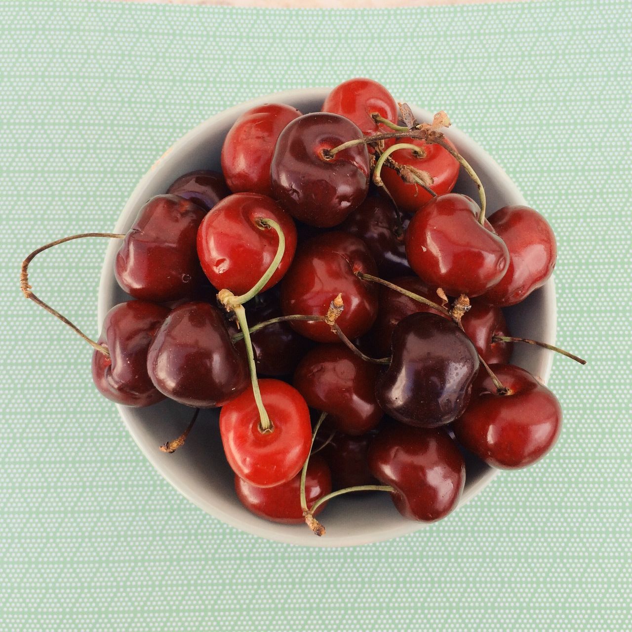 High angle view of cherries in bowl