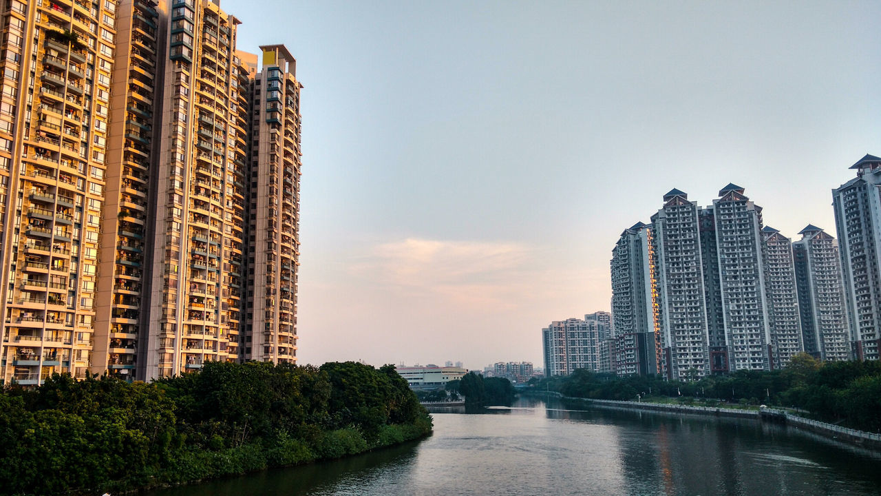 RIVER WITH BUILDINGS IN BACKGROUND