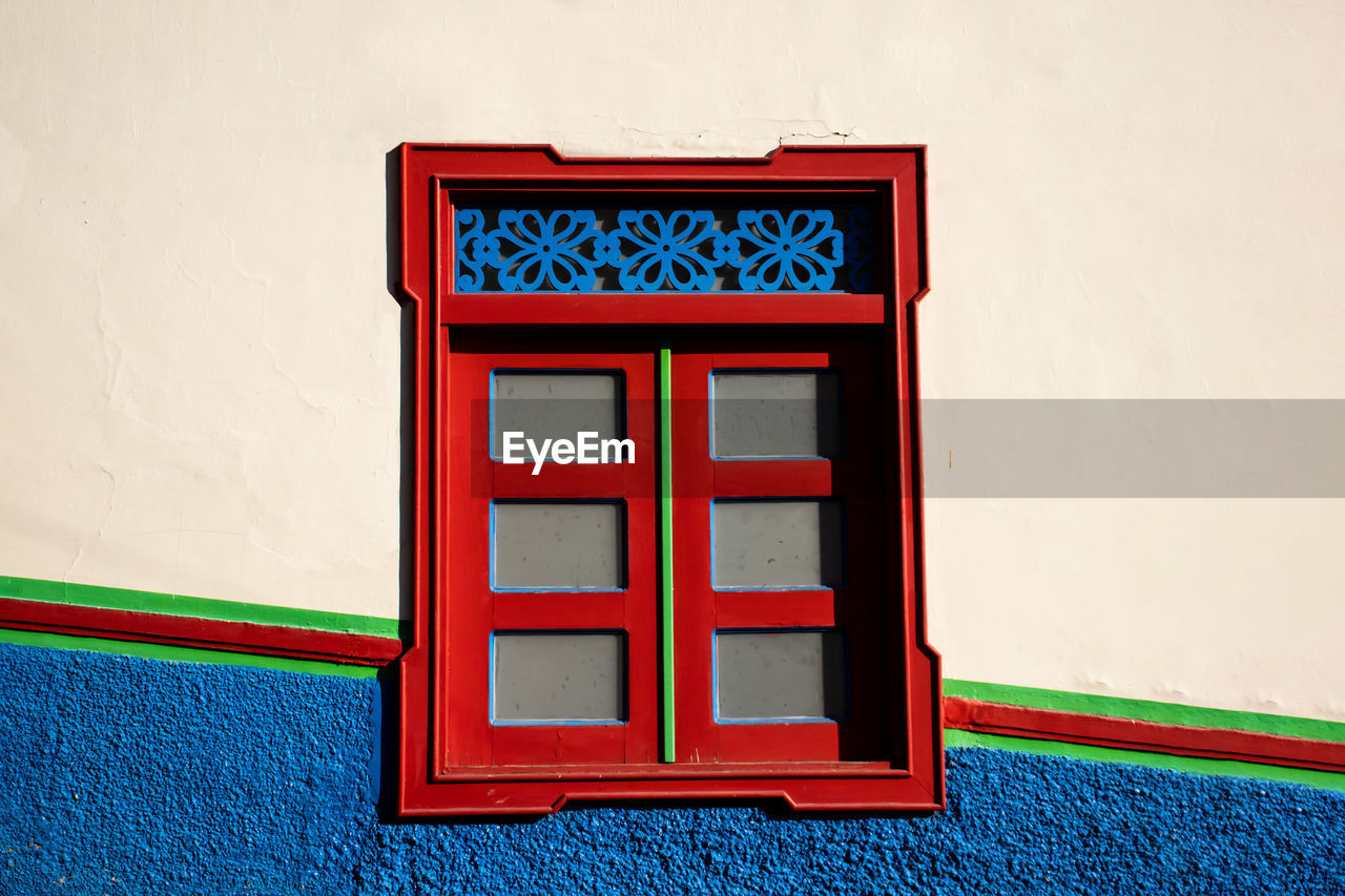 Beautiful window of the houses at the historical downtown of the heritage town of salamina 