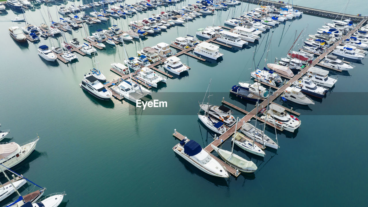 high angle view of boats moored in harbor