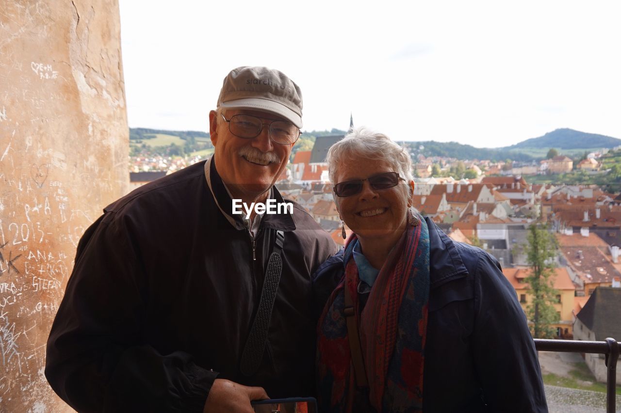 Portrait of senior couple at cesky krumlov town