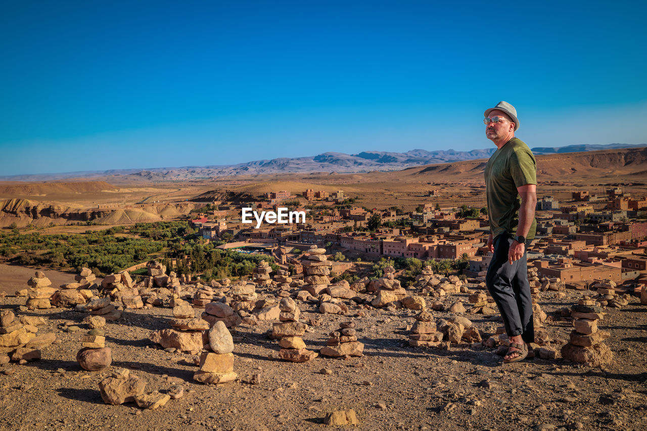 European tourist in morocco, in the atlas desert in aït-ben-haddou.