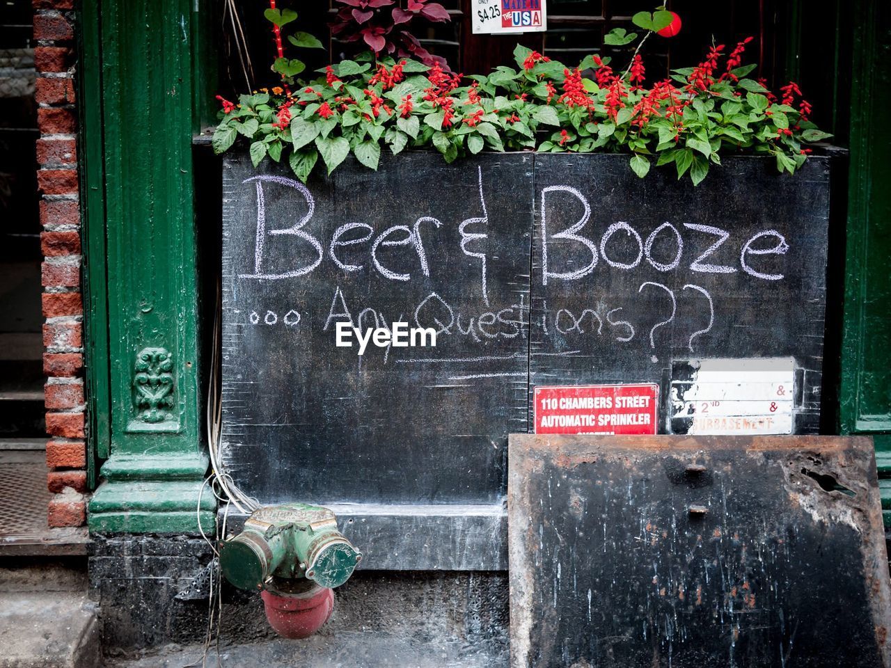 Humorous menu board outside pub