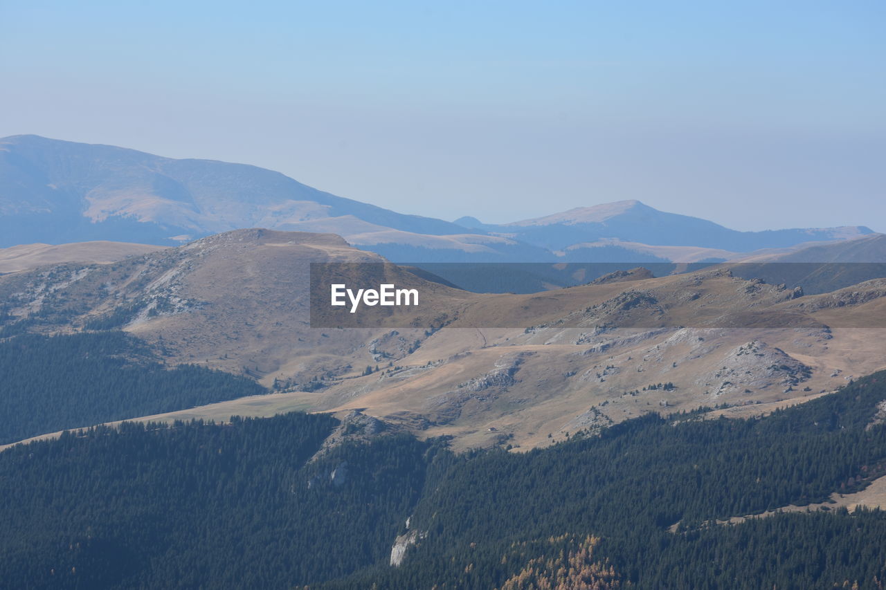 Scenic view of mountains against clear sky