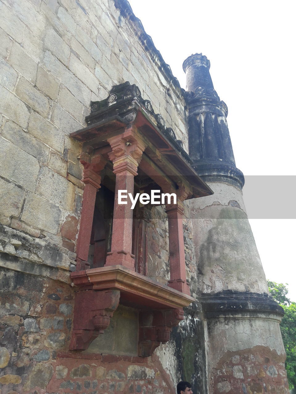 LOW ANGLE VIEW OF OLD TEMPLE BUILDING