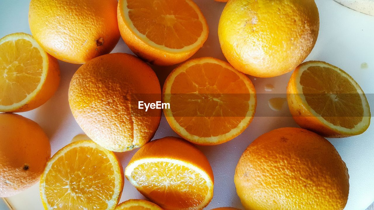 High angle view of fresh oranges on table