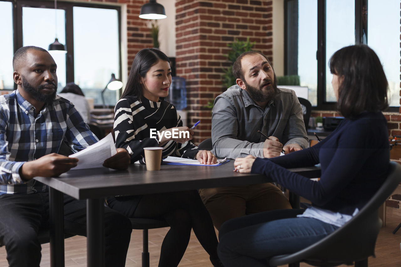 Business people taking interview in office