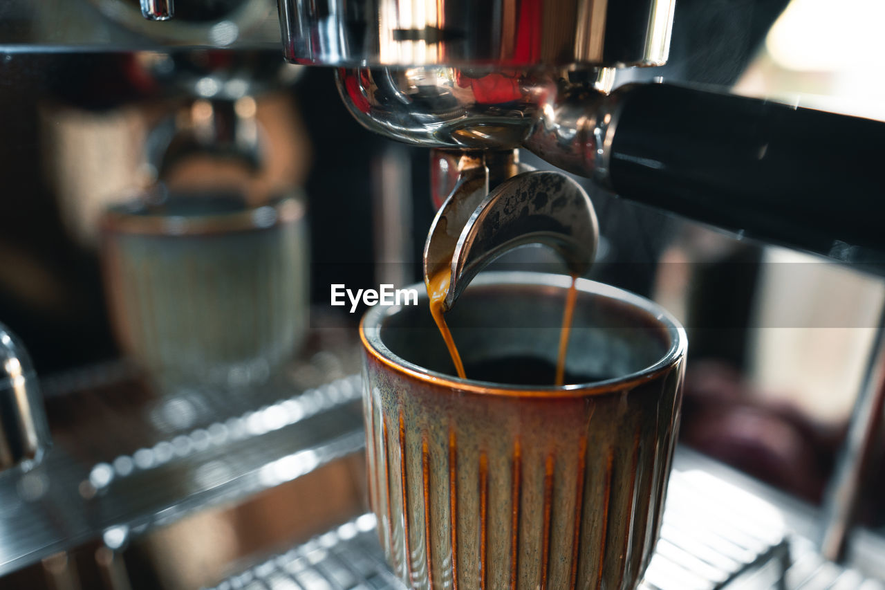 Close-up of coffee cup on table in cafe