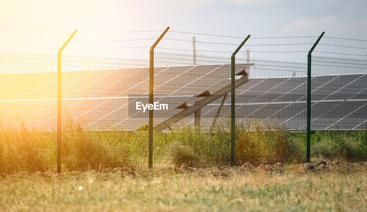 Solar panels in the middle of a field on a sunny day, ukraine