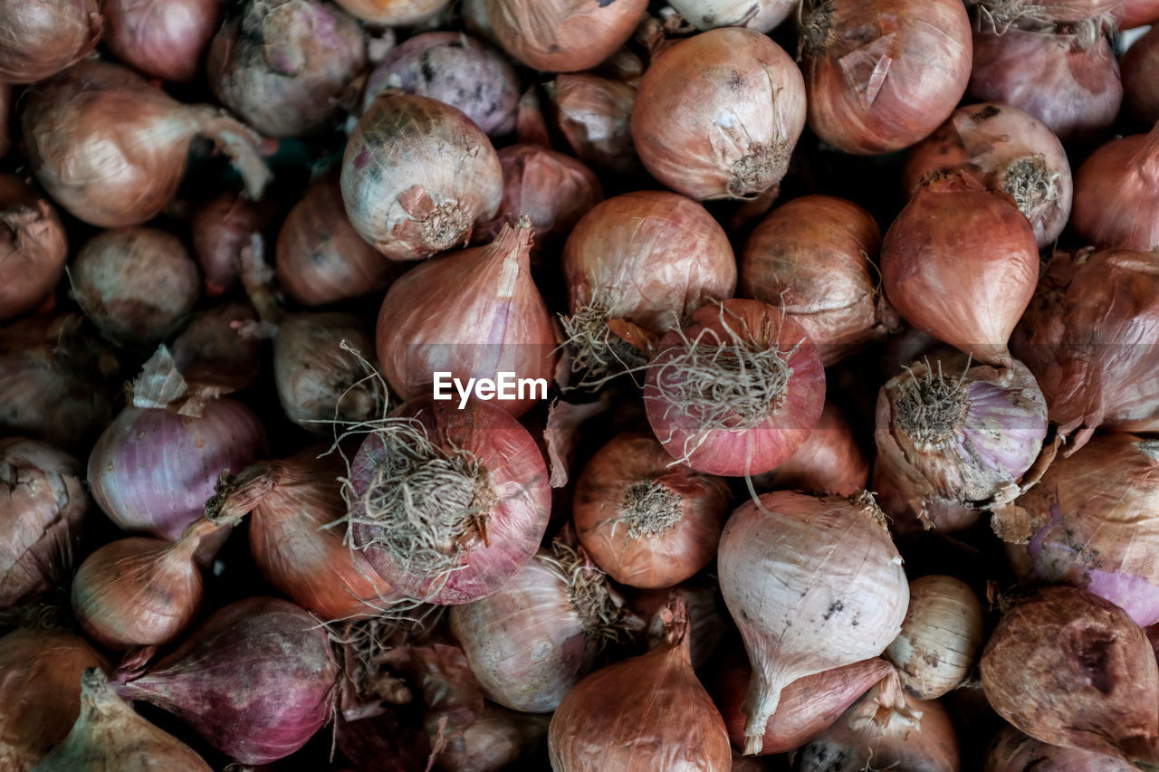 Full frame shot of onions for sale