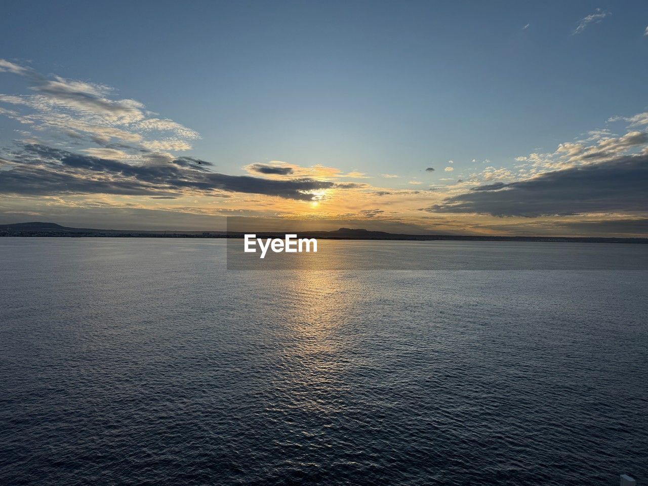 sky, water, horizon, sea, scenics - nature, beauty in nature, cloud, sunset, nature, tranquility, reflection, ocean, dawn, coast, environment, tranquil scene, sunlight, landscape, no people, dramatic sky, seascape, blue, shore, horizon over water, travel, travel destinations, outdoors, land, idyllic, beach, evening, sun, body of water, bay, mountain