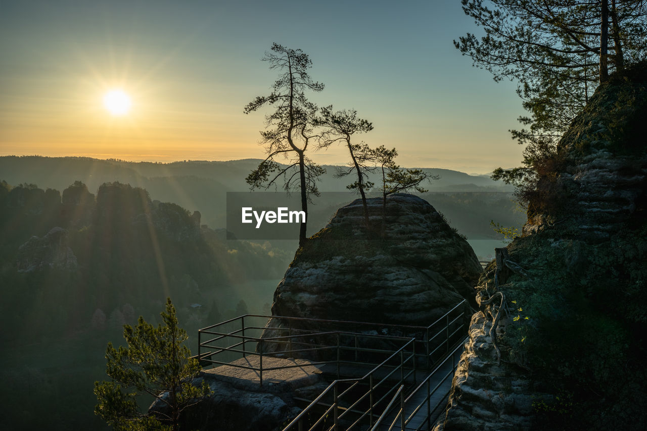 Scenic view of mountains against sky during sunset