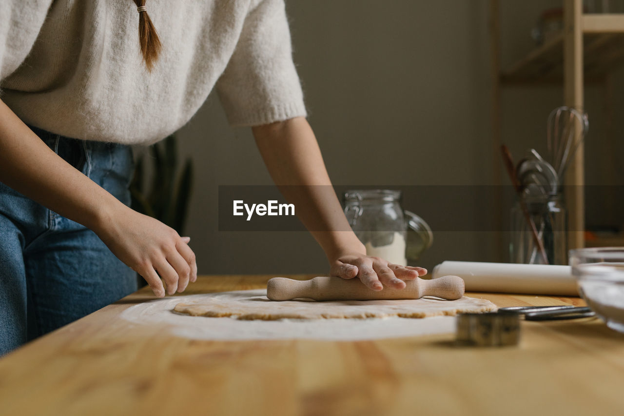 Young woman making christmas cookies