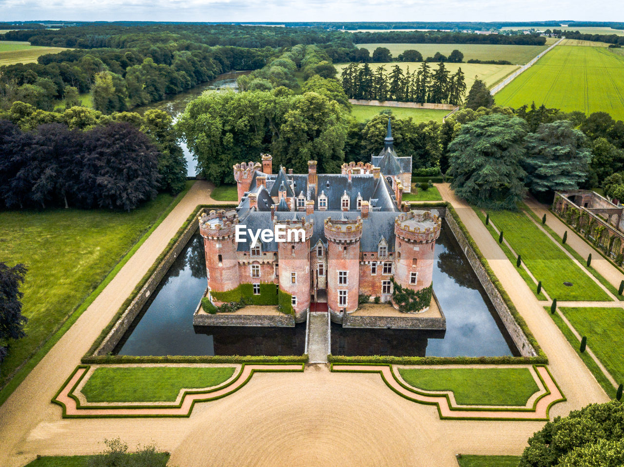 High angle view of palace amidst over pond amidst garden