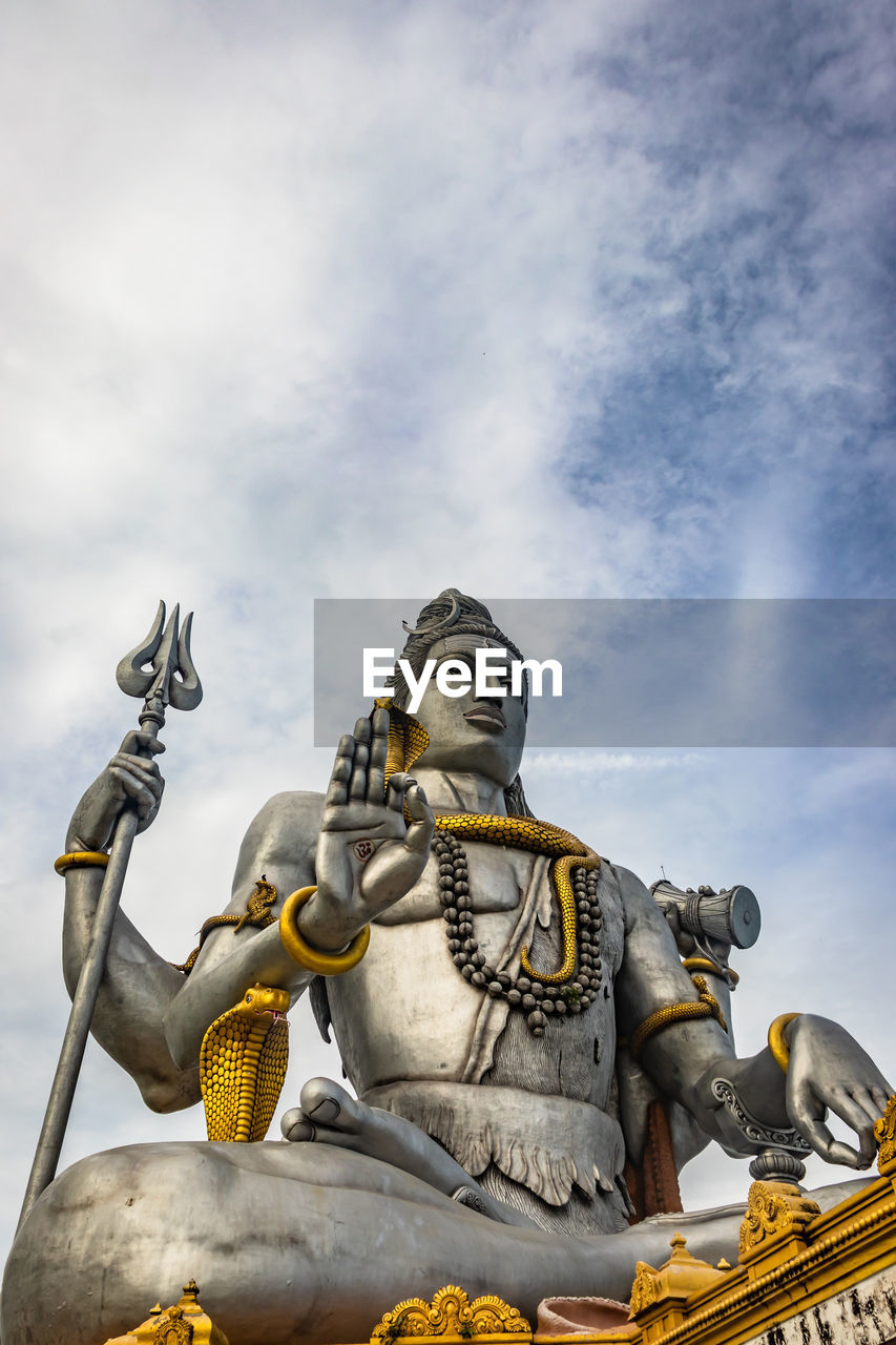 Shiva statue isolated at murdeshwar temple close up shots from low angle