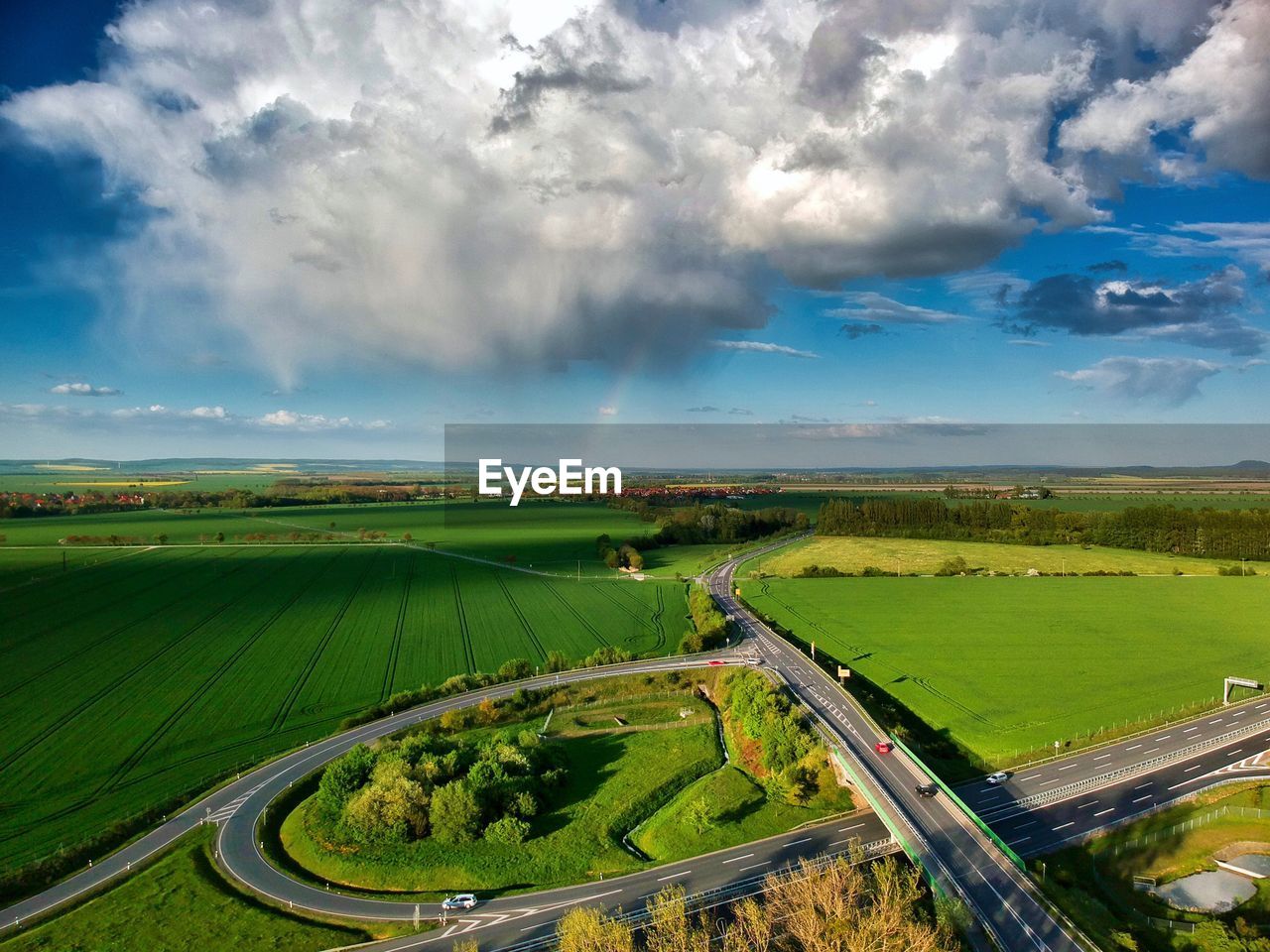 Aerial view of agricultural landscape against sky