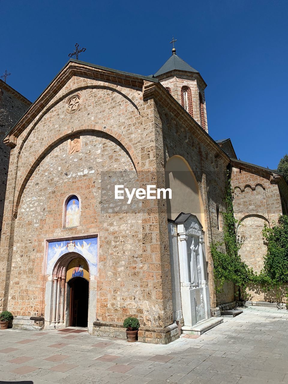 Historic building against clear blue sky