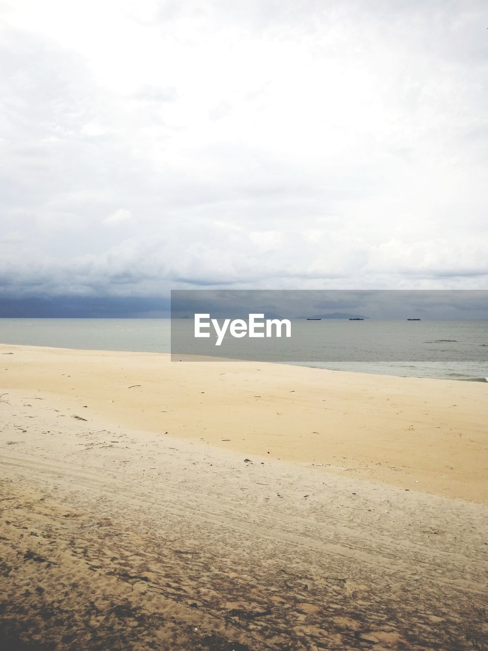 VIEW OF BEACH AGAINST SKY