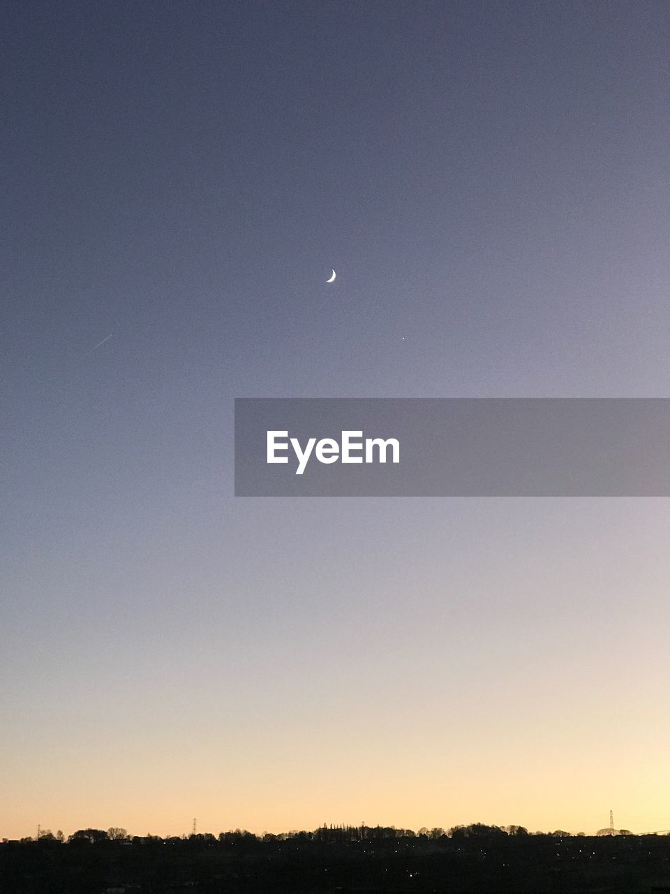 SCENIC VIEW OF MOON IN SKY