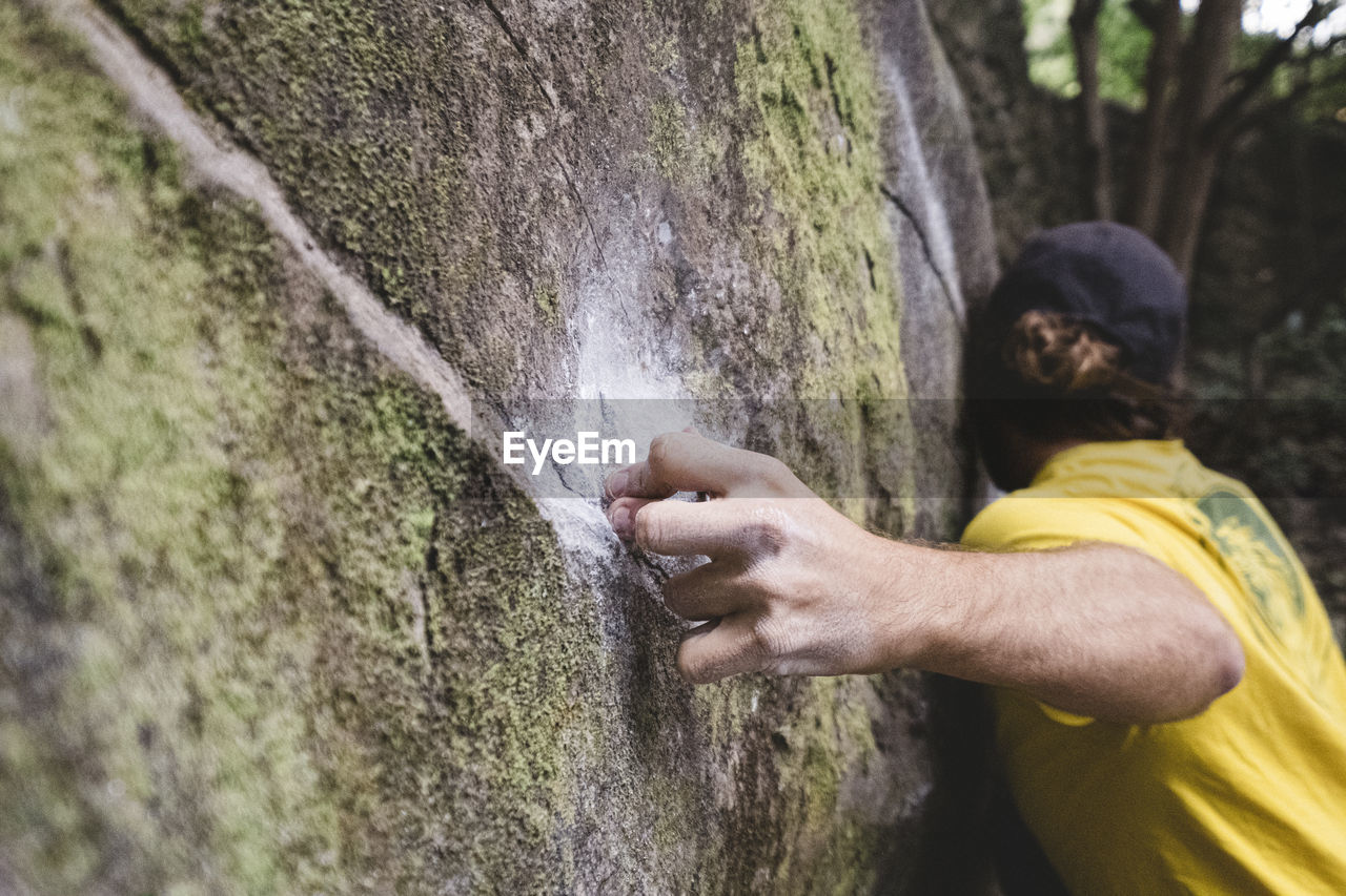 Close up of a rock climber hand on rock