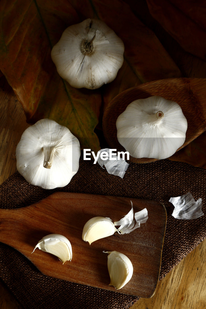 High angle view of garlic on table