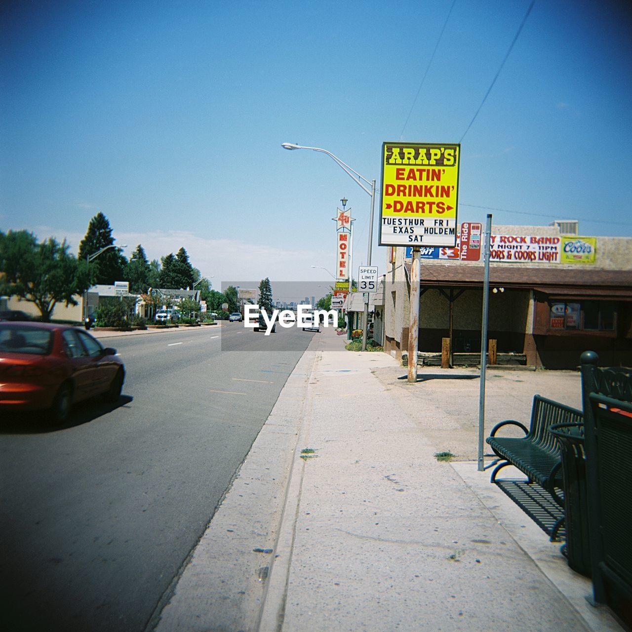 ROAD SIGN AGAINST CLEAR SKY