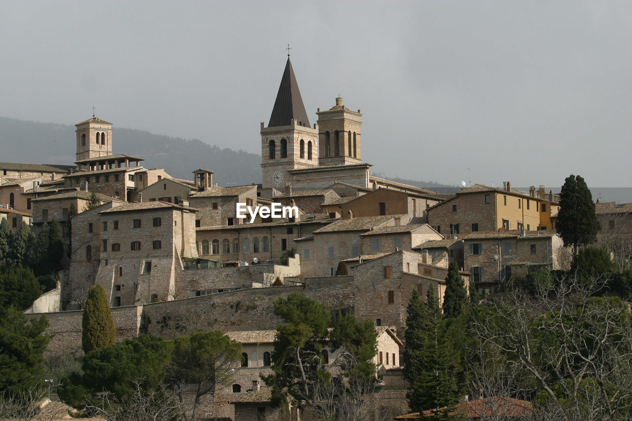 Cathedral in city against clear sky