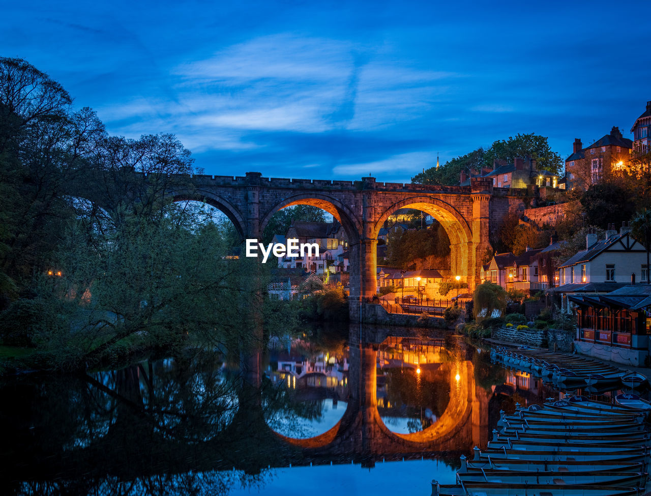 reflection of bridge over river